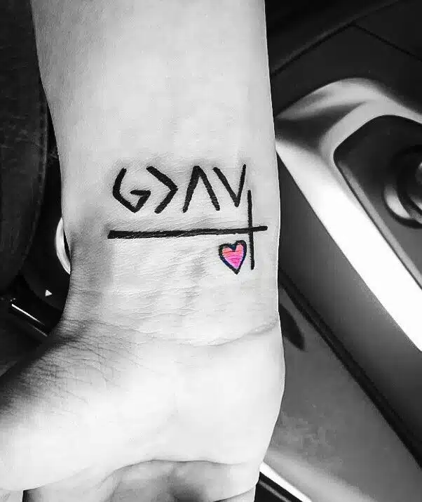 God Is Greater Than the Highs and Lows Wrist Tattoo