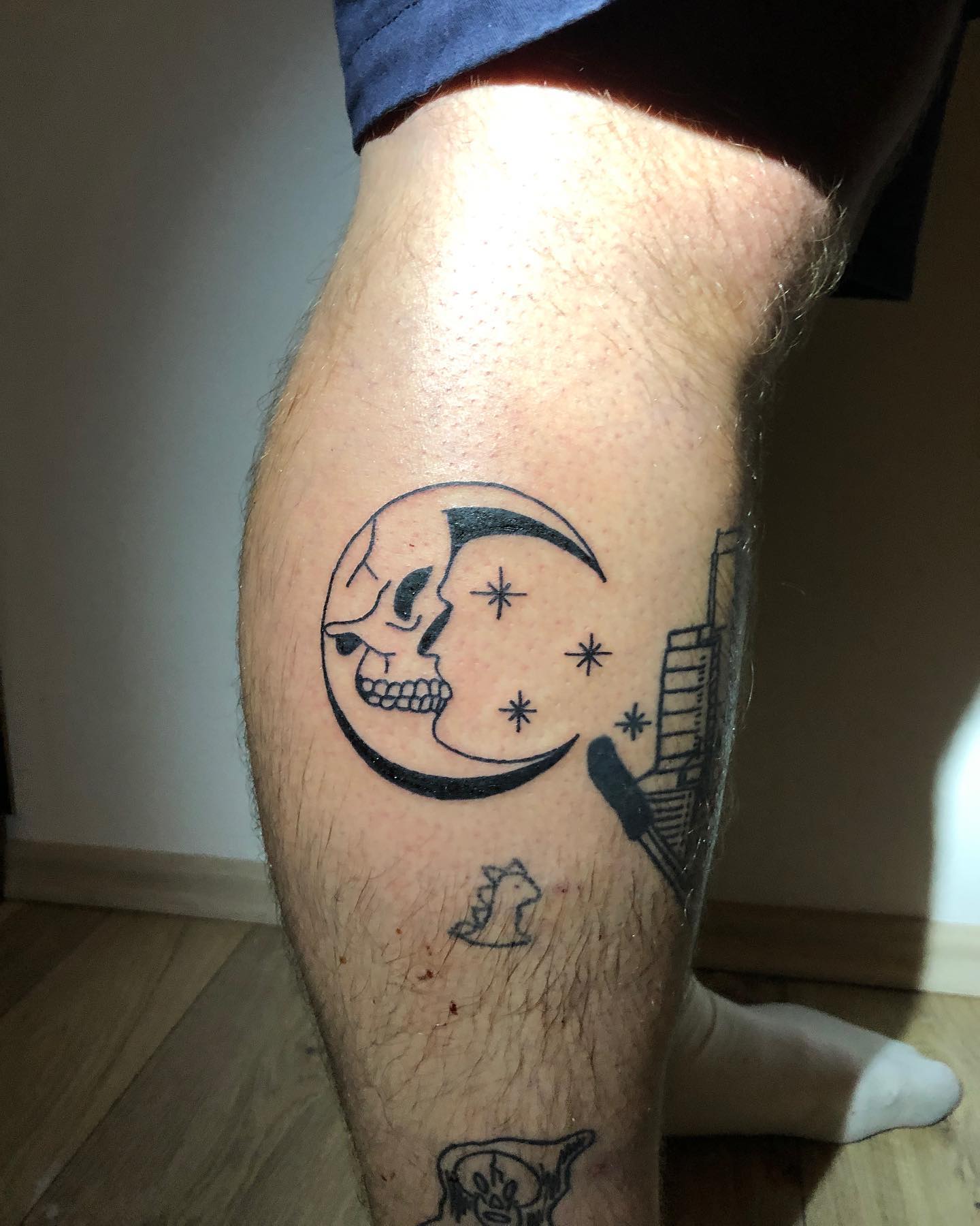 Moon And Stars Tattoo On Leg