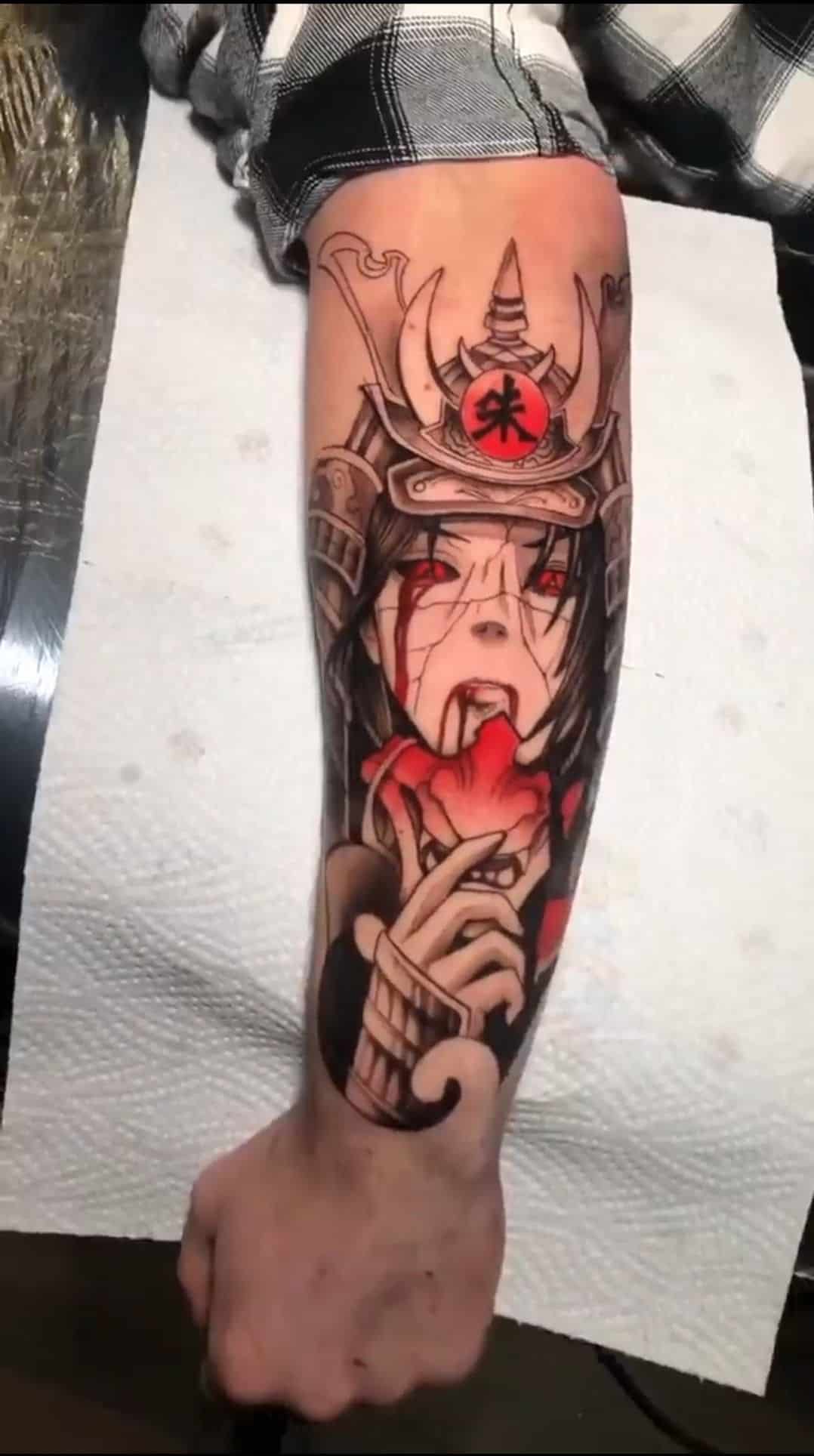 Anime forearm tattoo