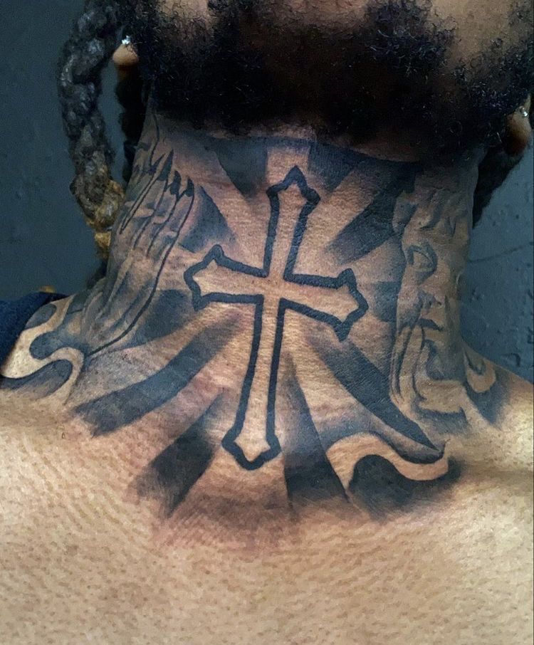 Cross hood tattoo