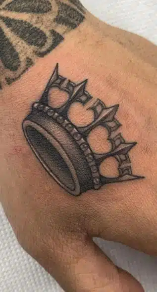 Crown hood tattoo