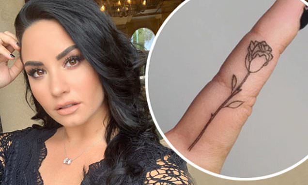 Demi Lovatos Rose Tattoo on the Finger