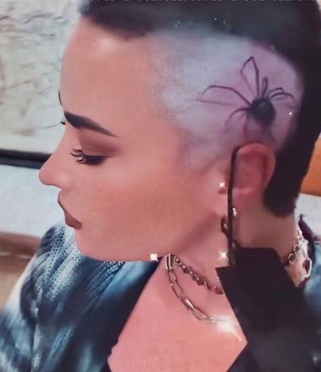 Demi Lovatos spider tattoo