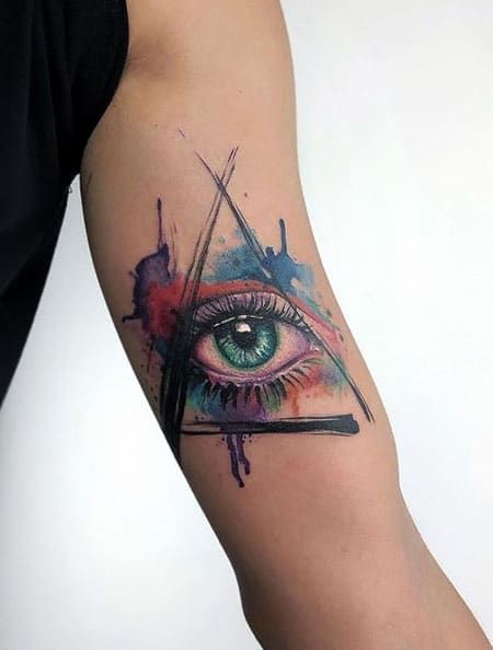 Evil eye triangle tattoo