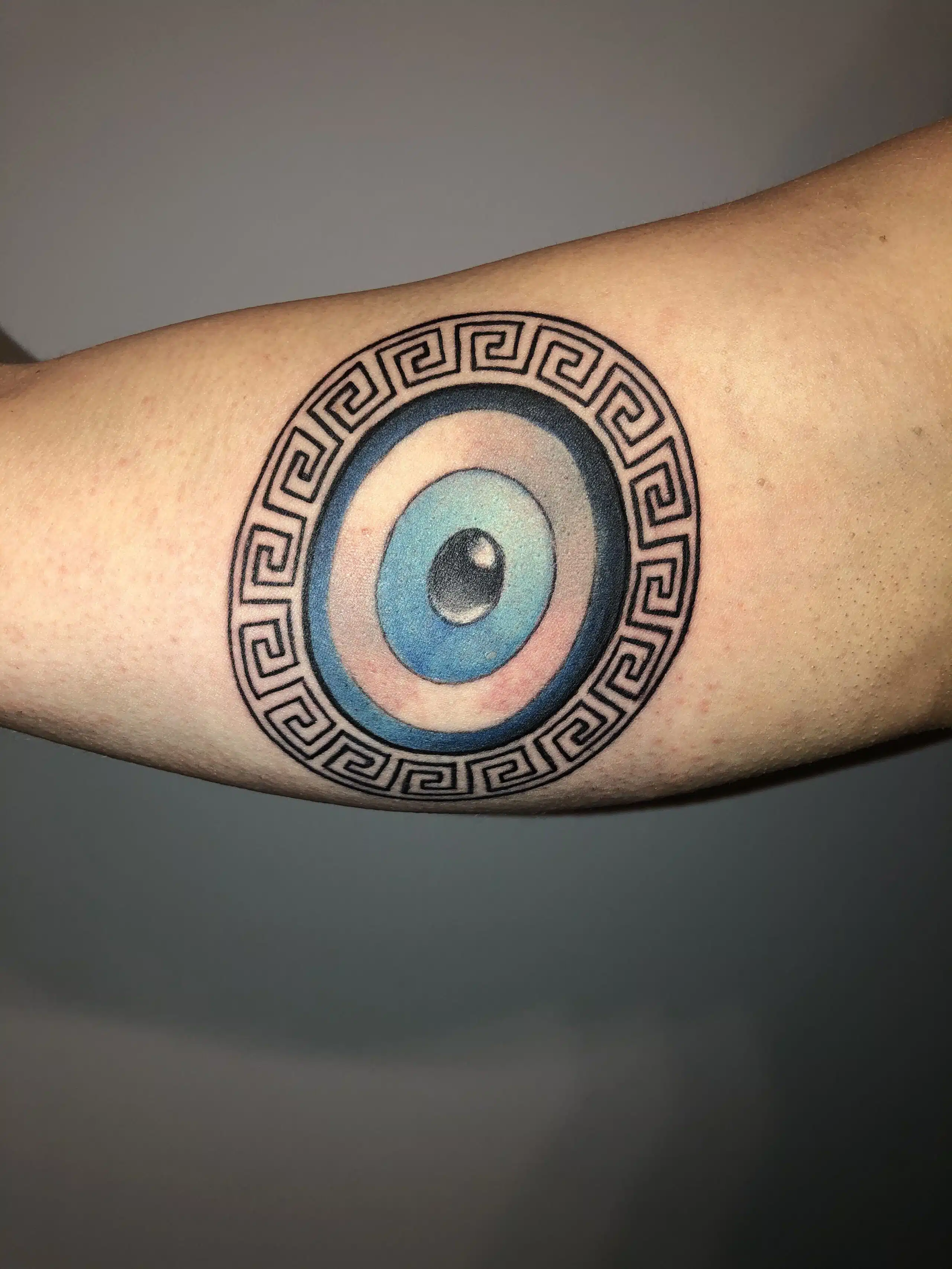 Greek evil eye tattoo