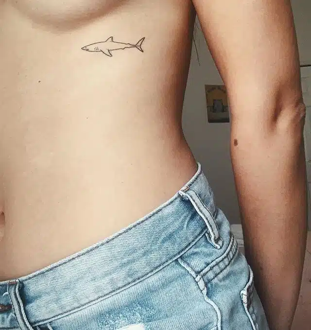 Minimalist shark tattoo