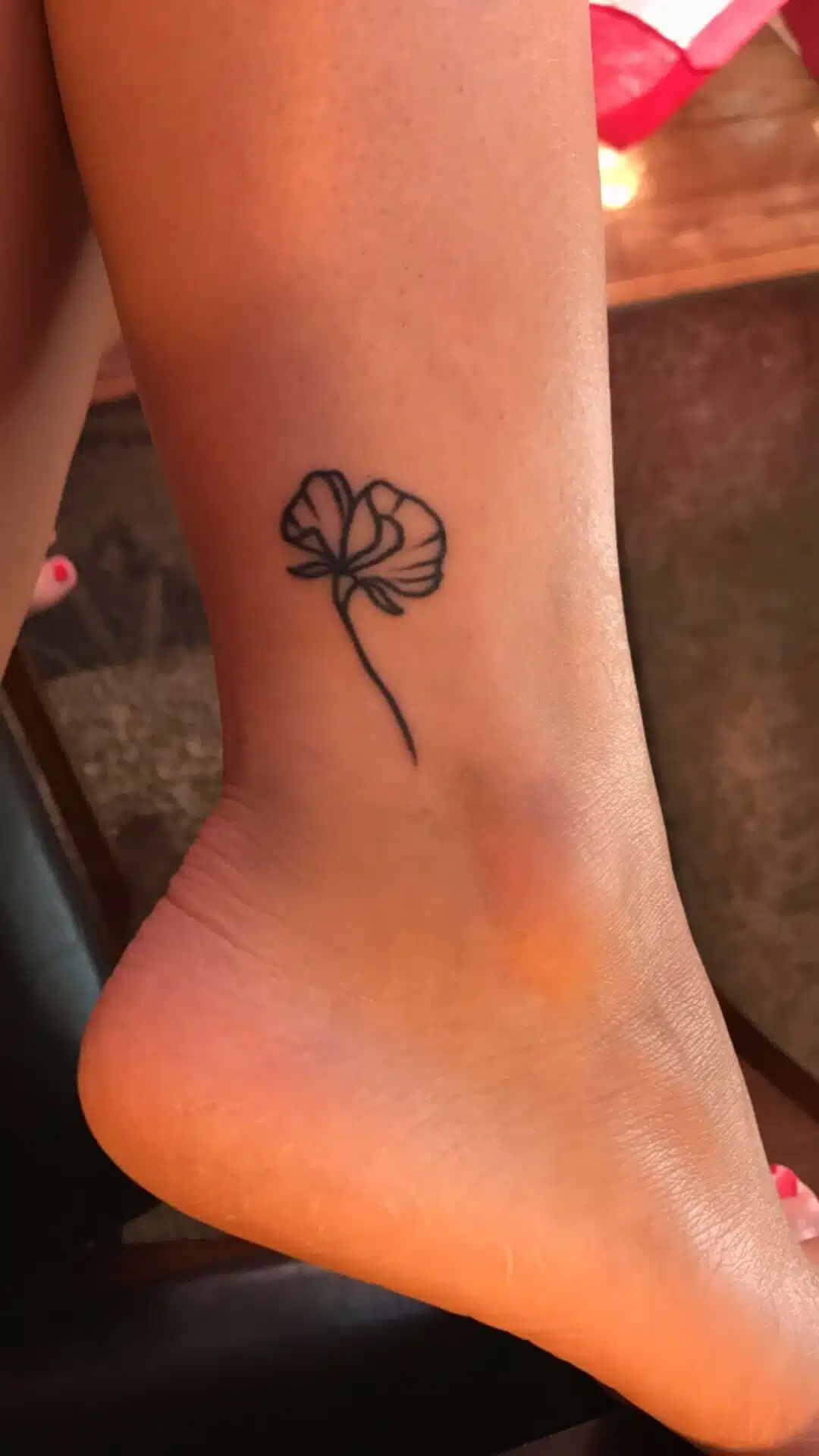 Minimalist sweet pea flower tattoo