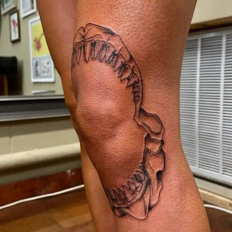 Shark jaw tattoo