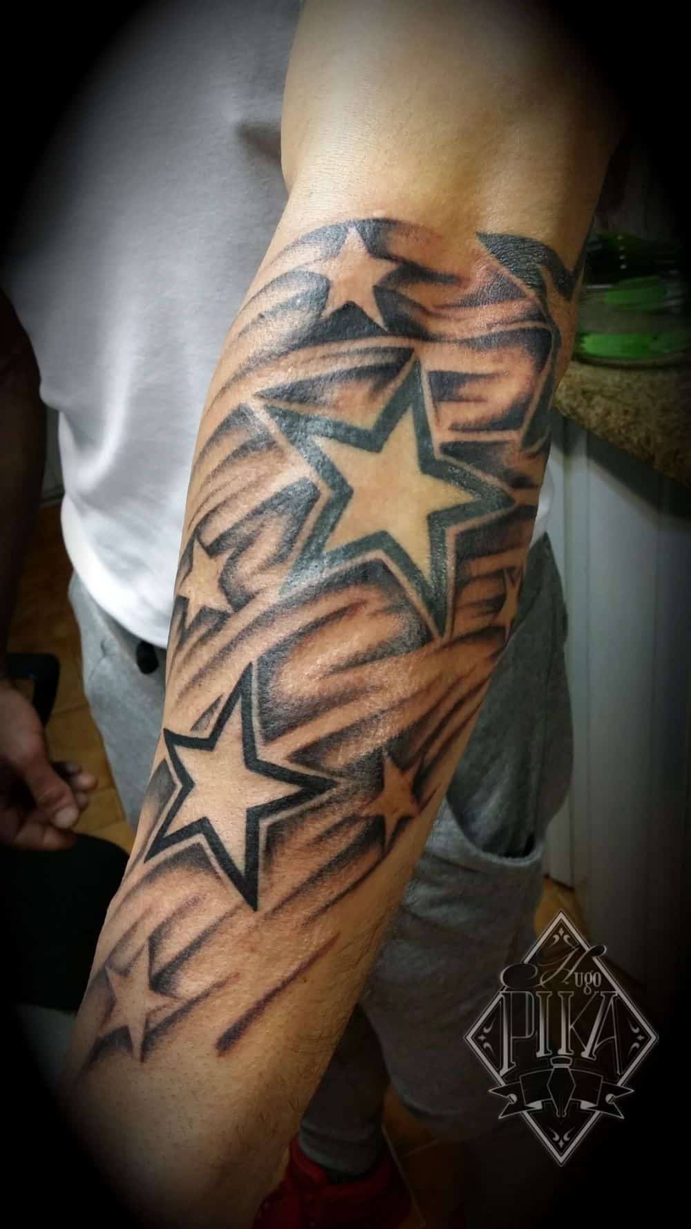 Stars hood tattoo