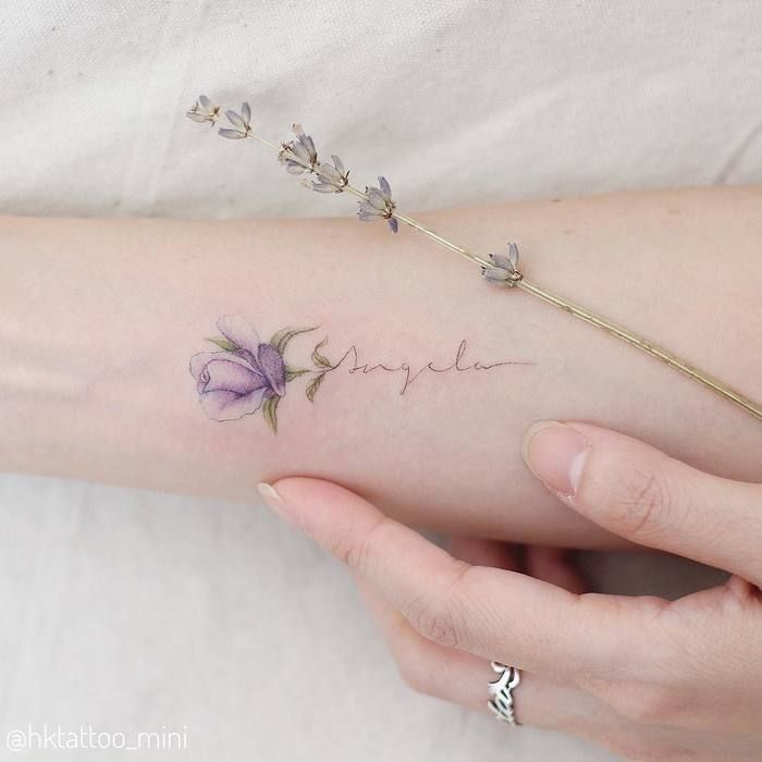 Sweet pea flower tattoo with a name
