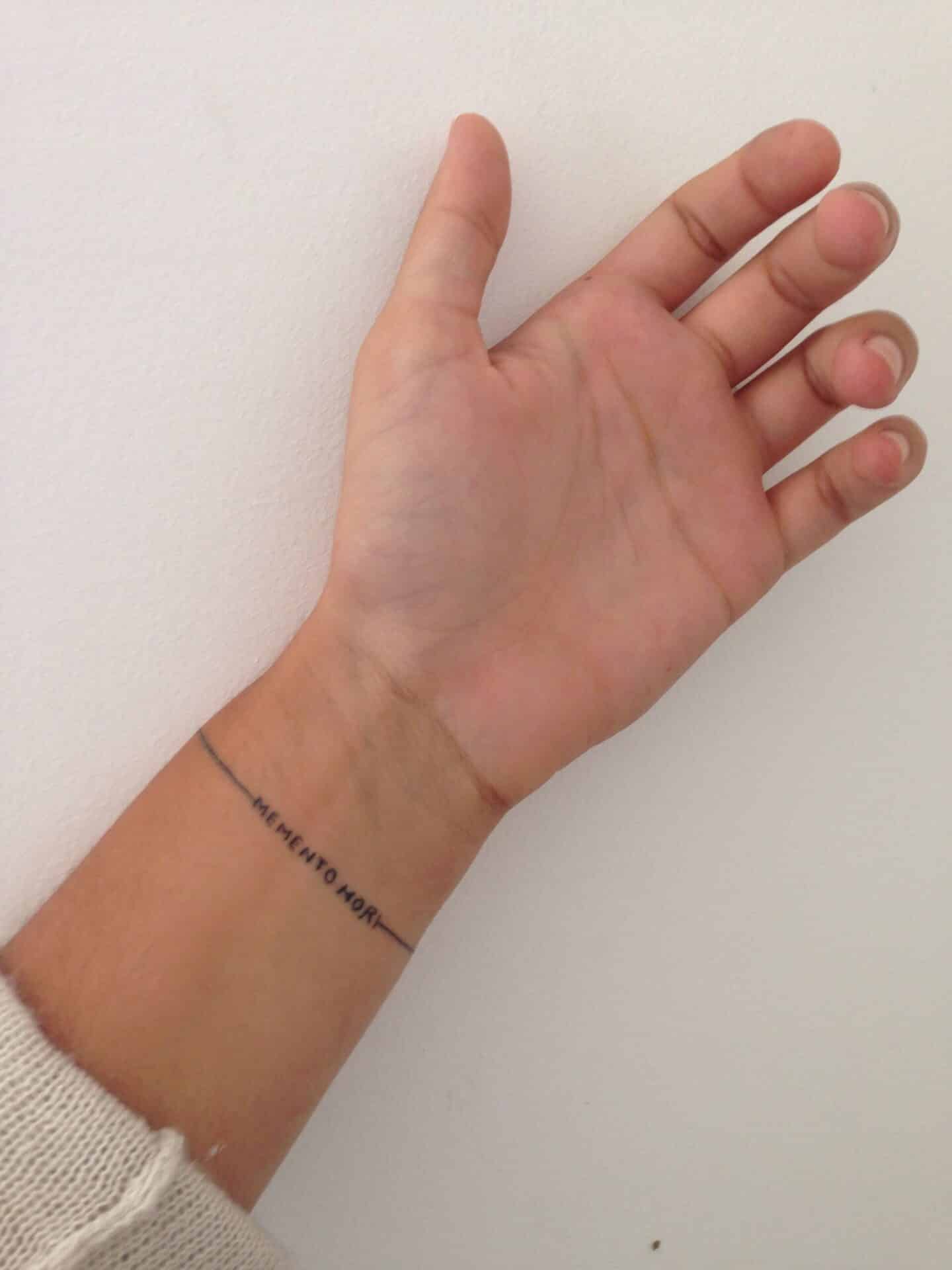 Wrist memento Mori tattoo