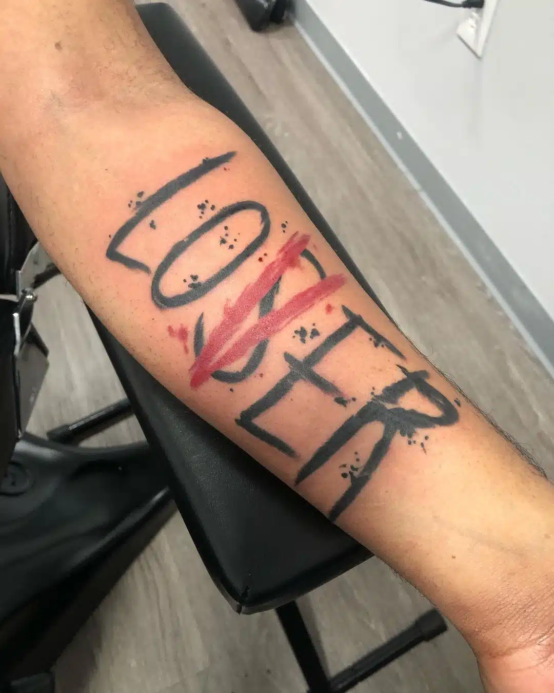 loser lover forearm tattoo
