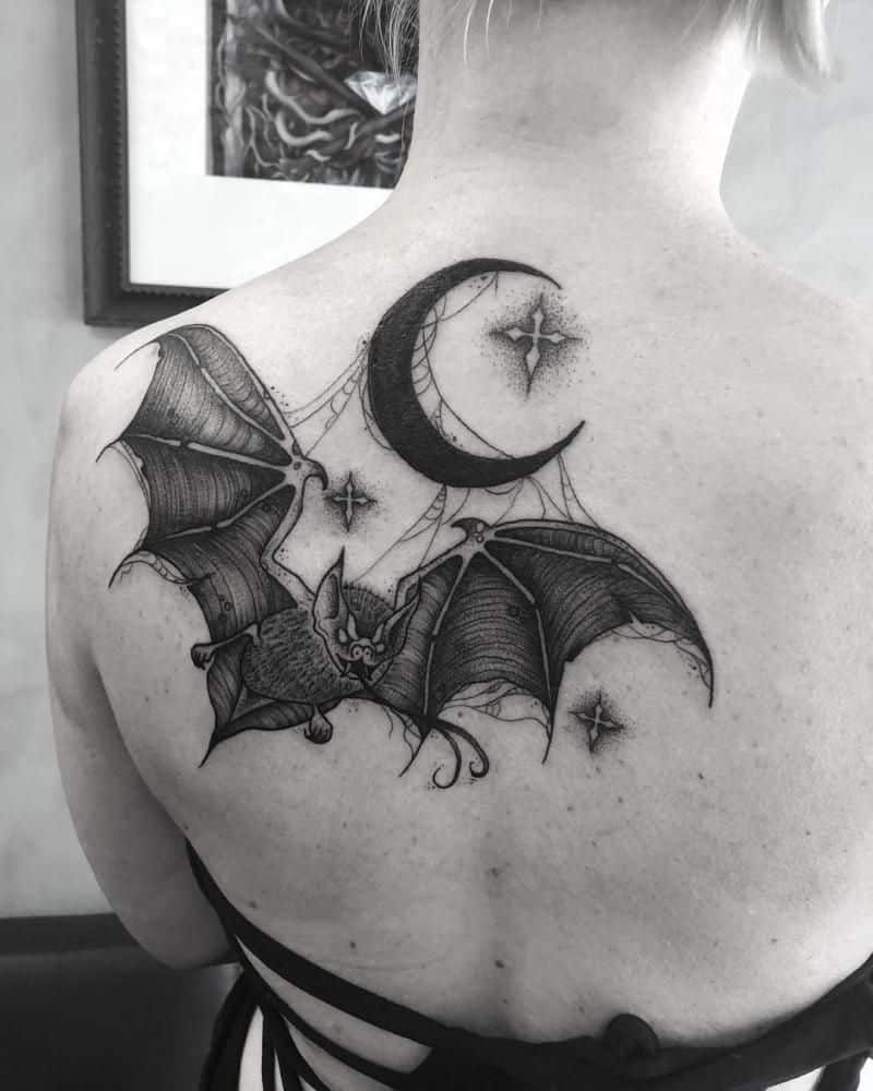 Bat and moon tattoo