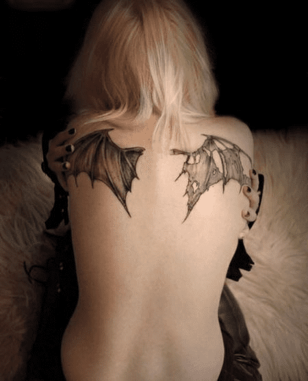 Bat wings tattoo