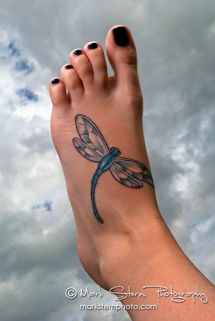 Dragonfly leg tattoo for women
