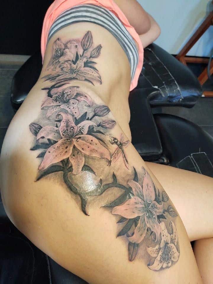 Flower leg tattoo for women
