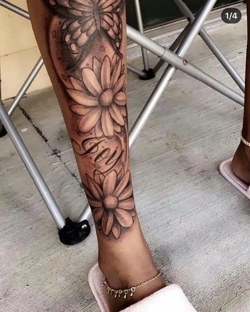 Flower shin tattoo