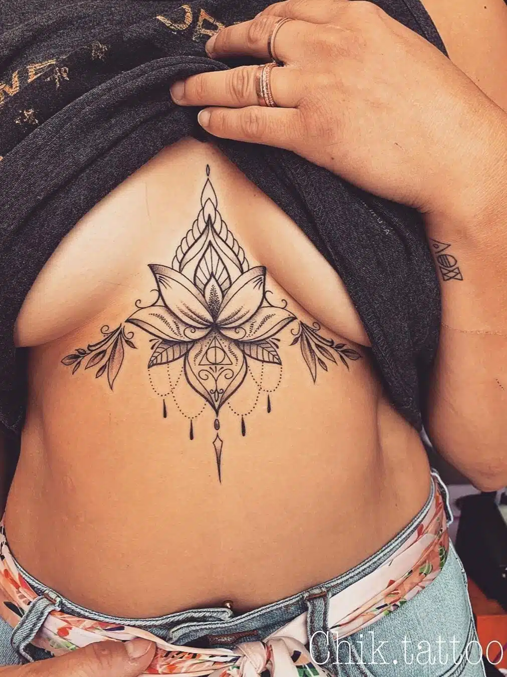 Lotus chest tattoos for women
