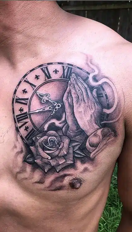 Praying hands with clock tattoo
