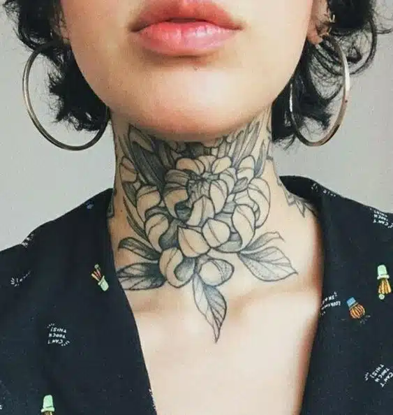 Simple Flower throat tattoo for women