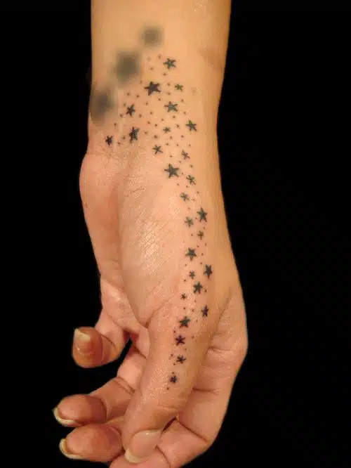 Star hand tattoos for women