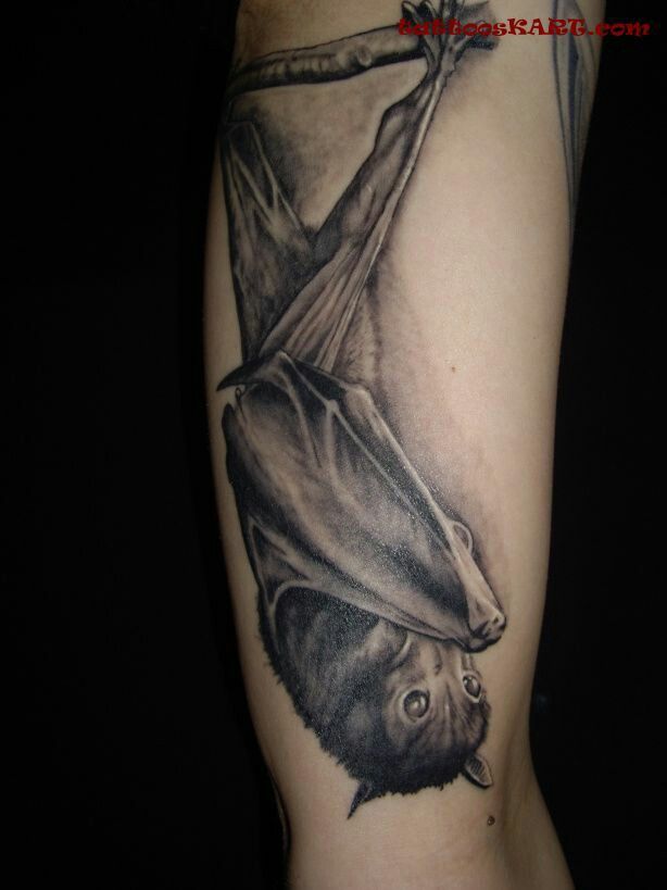 Upside down bat tattoo