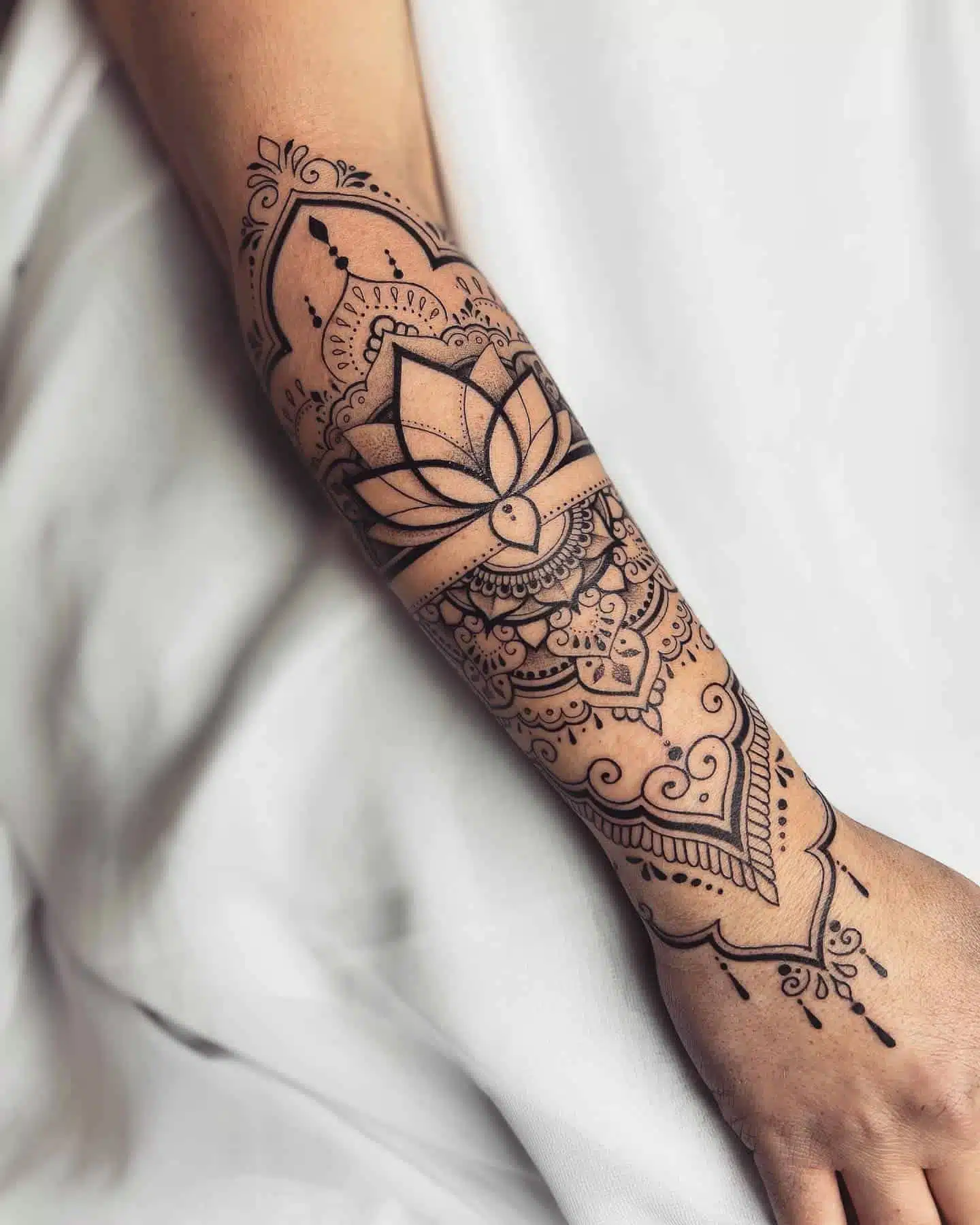 forearm tattoos for women mandala design