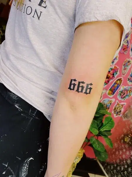 Elbow 666 angel number tattoo