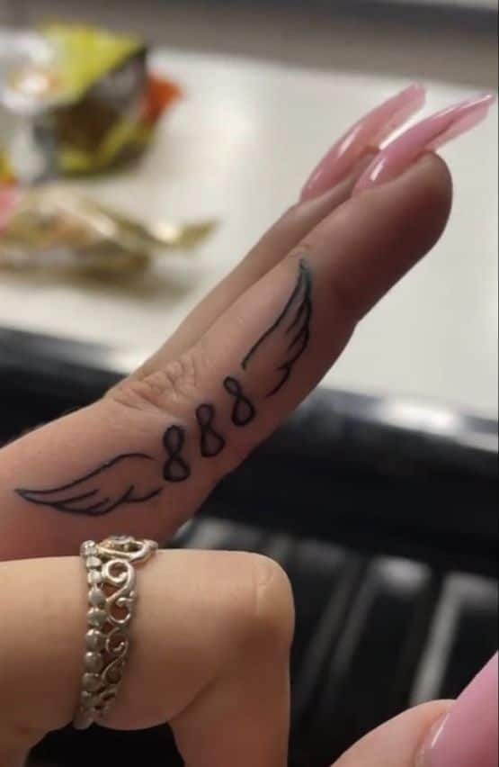 Finger 888 angel number tattoo