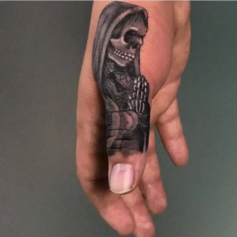 Finger Santa Muerte tattoo