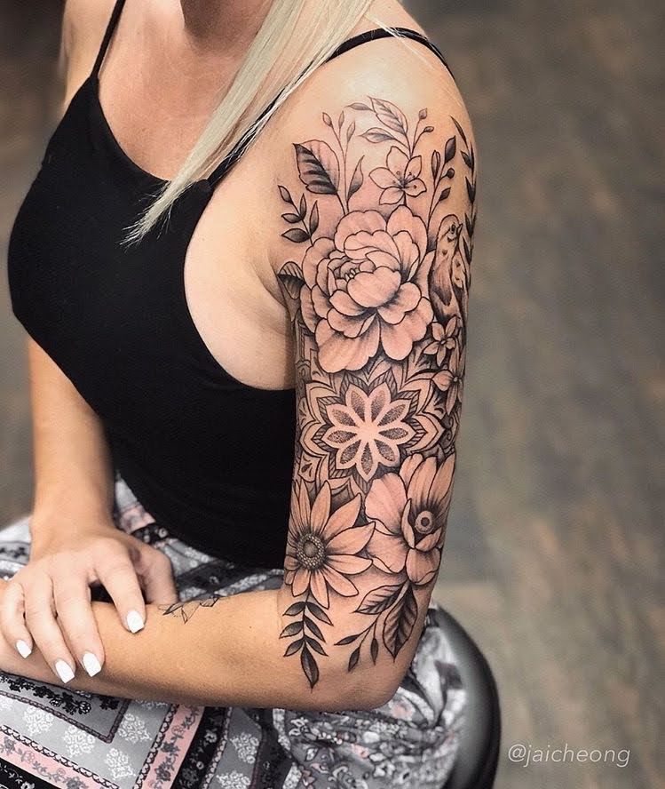 Floral designs half sleeve tattoo