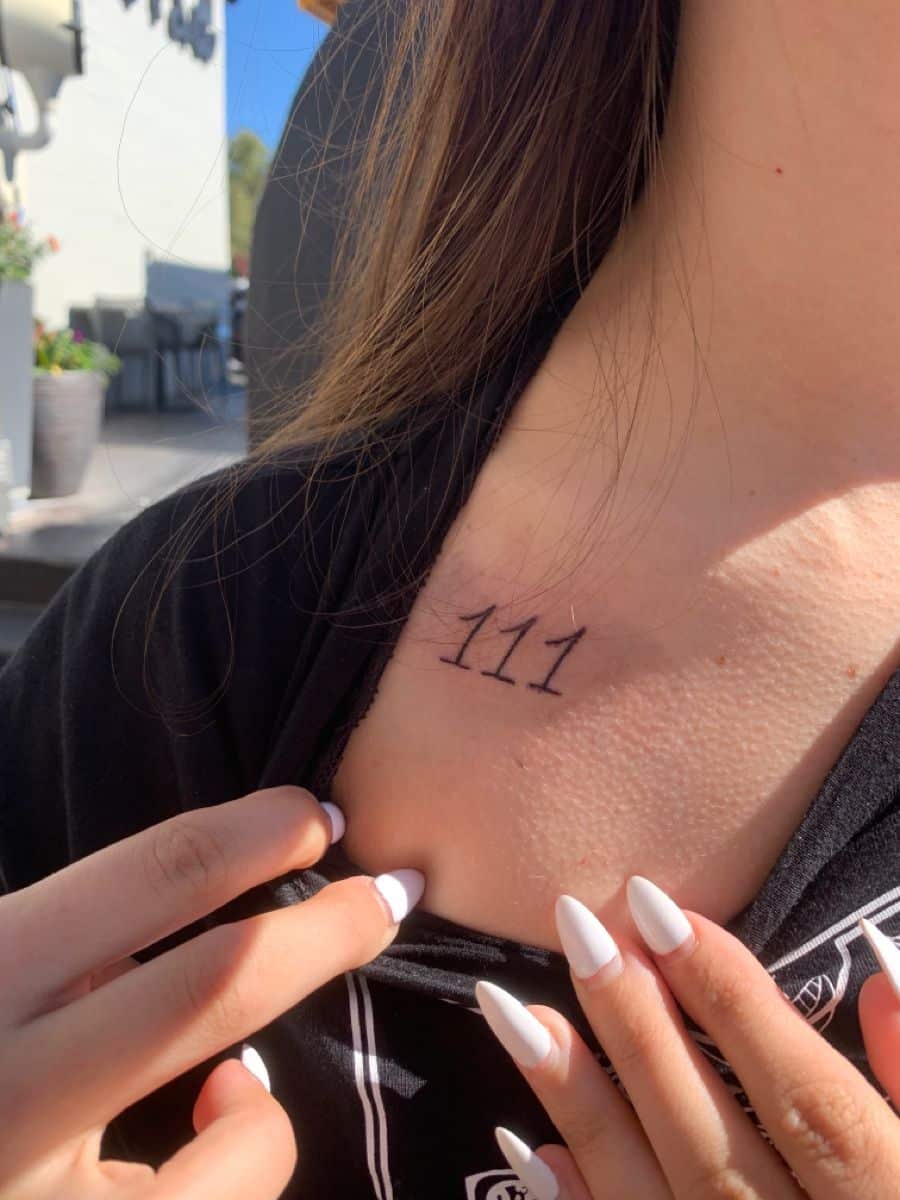 Neck 111 angel number tattoo