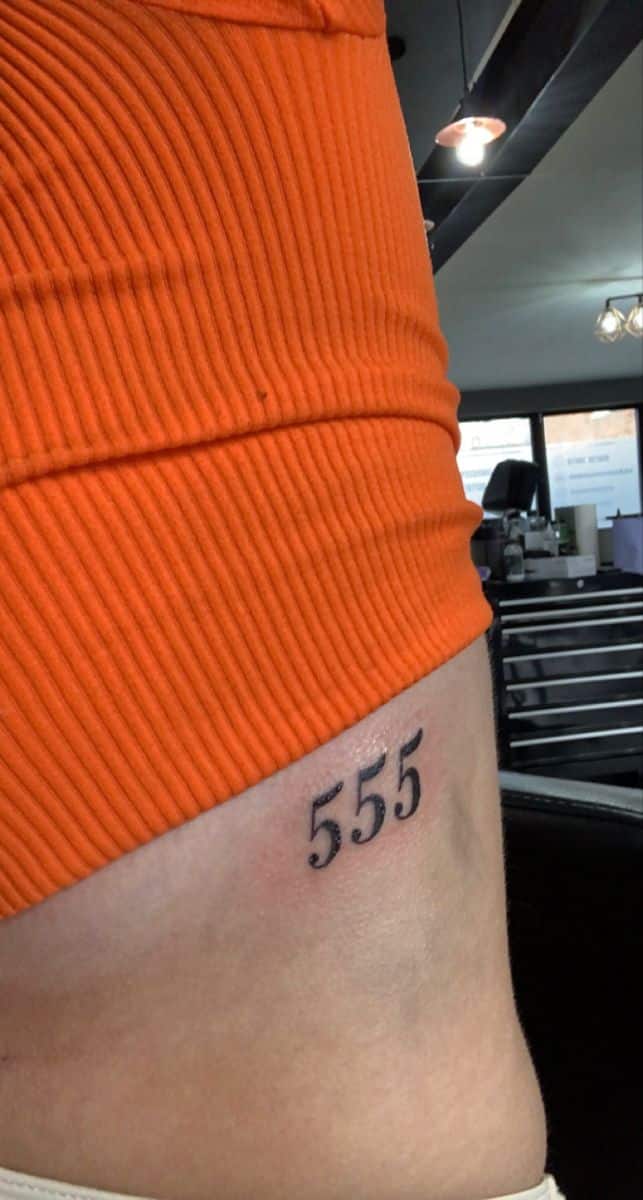 Ribs 555 angel number tattoo