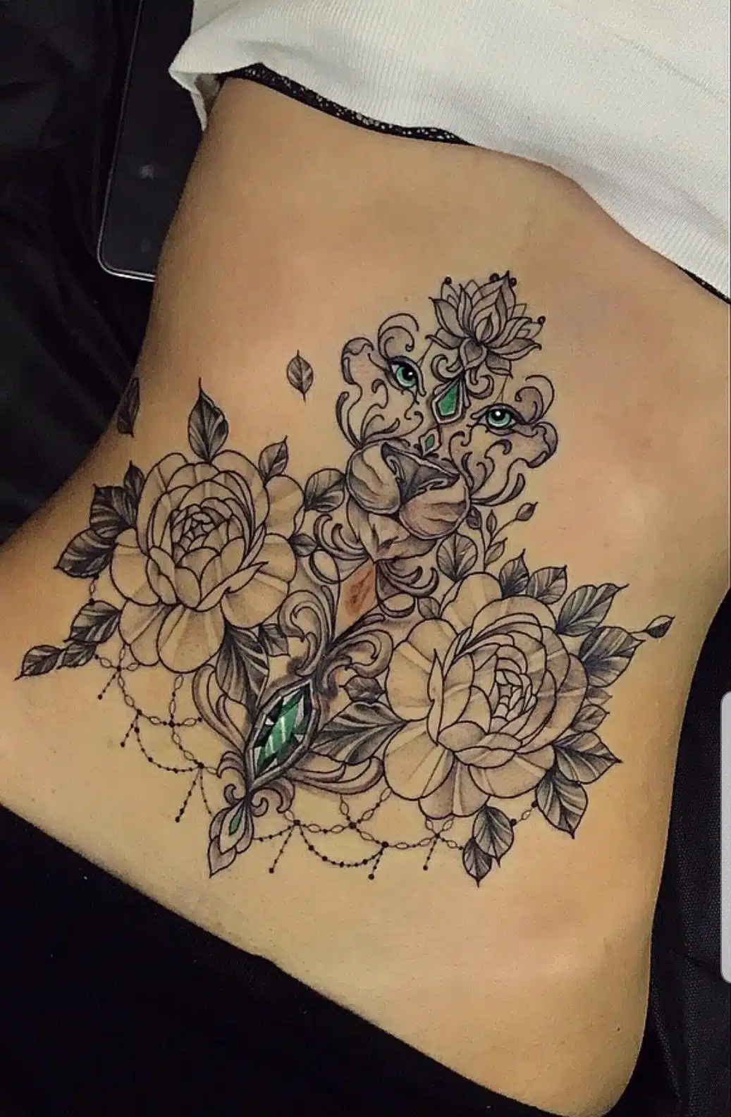 Floral stomach tattoos for women