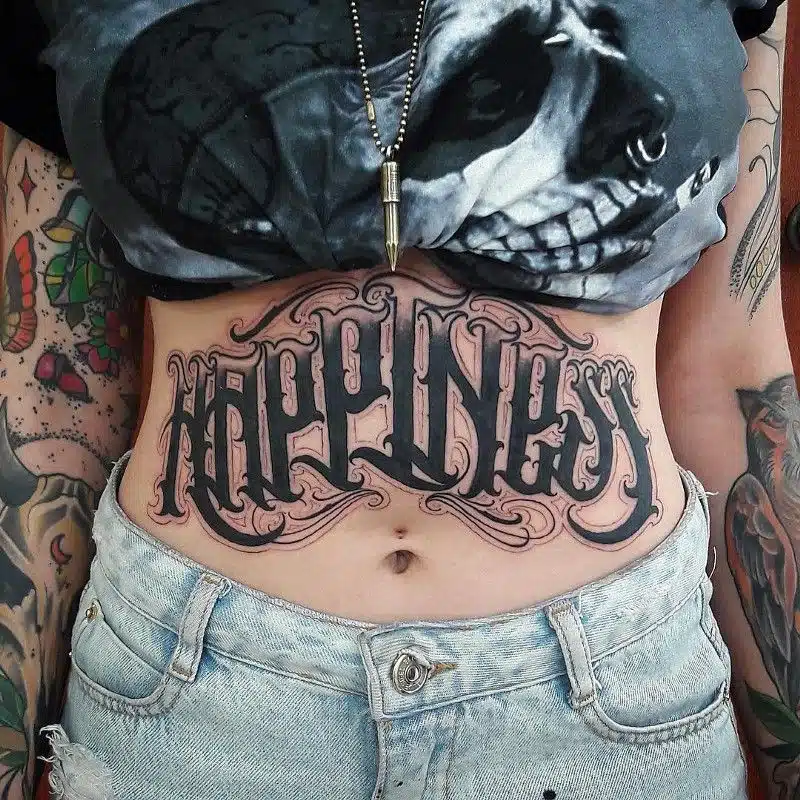 Lettering or quoting stomach tattoos for women