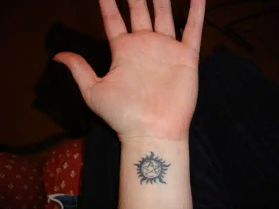 Wrist supernatural tattoo