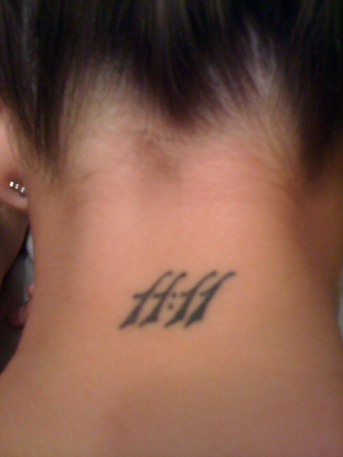 Back Of The Neck 1111 Tattoo