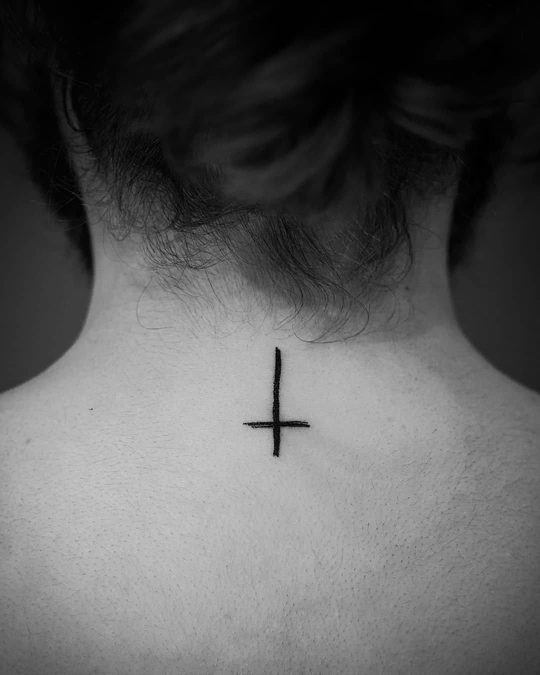 Back Of The Neck Upside Down Cross Tattoo