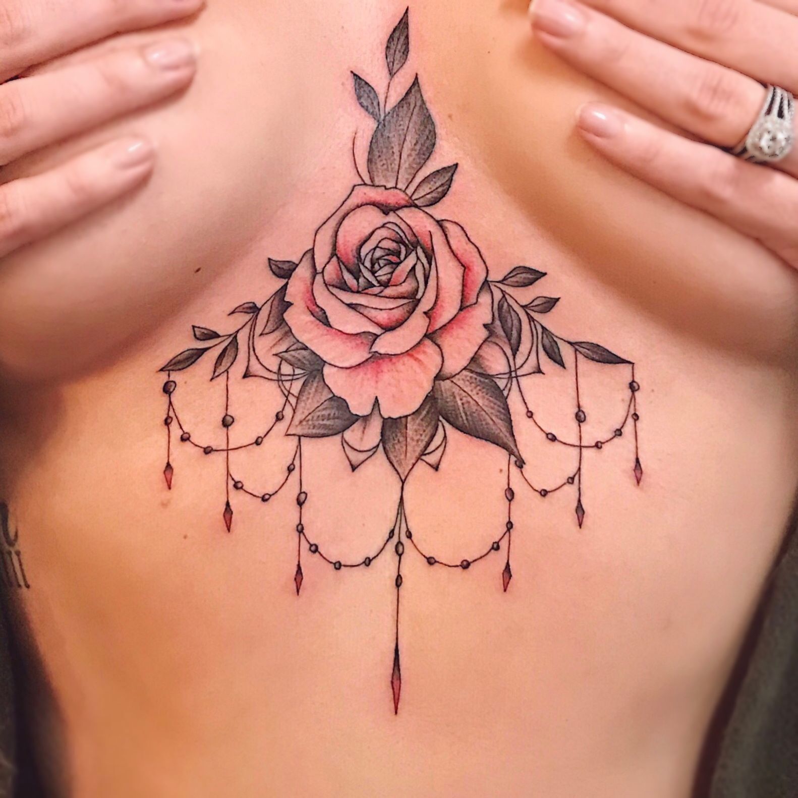 Floral Design Sternum Tattoos