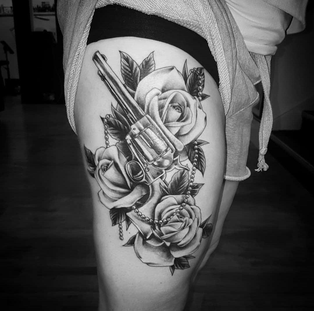 Gun With A Rose Tattoo