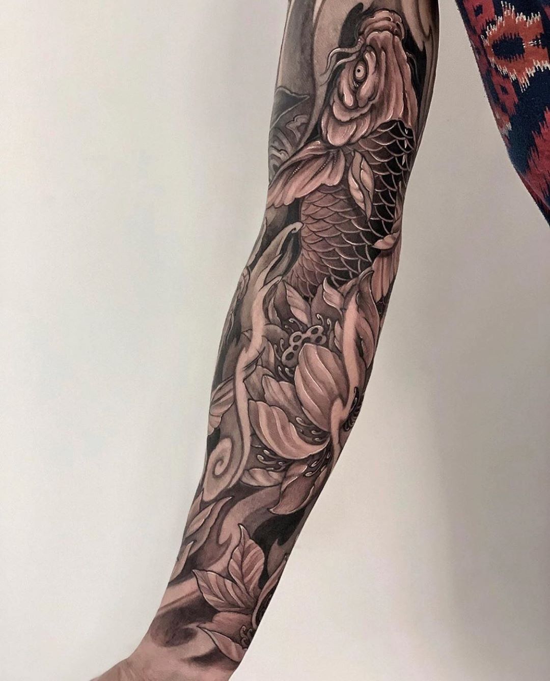 Lotus And Koi Fish Tattoo