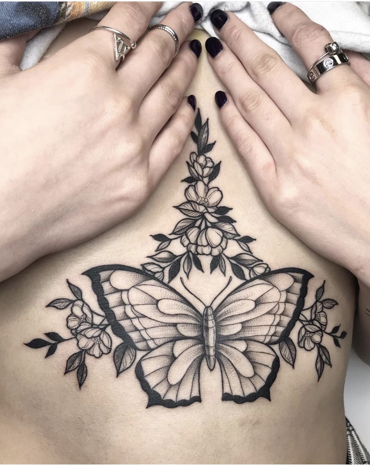 Moth Or Butterfly Sternum Tattoos