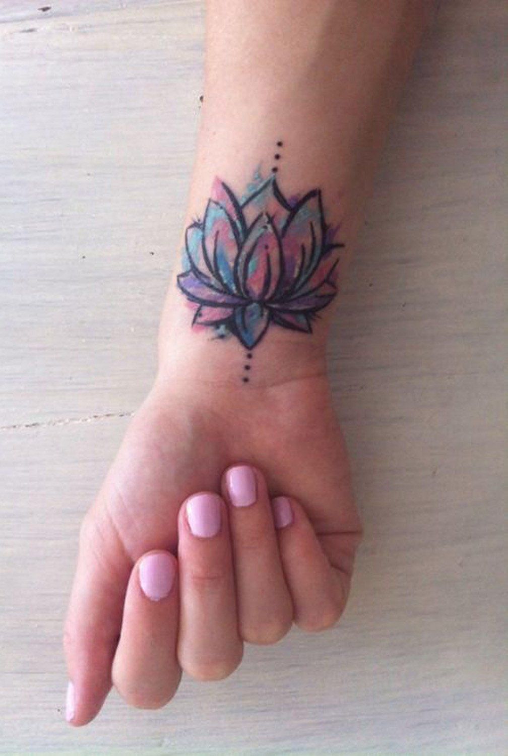 Wrist Placement Lotus Tattoo